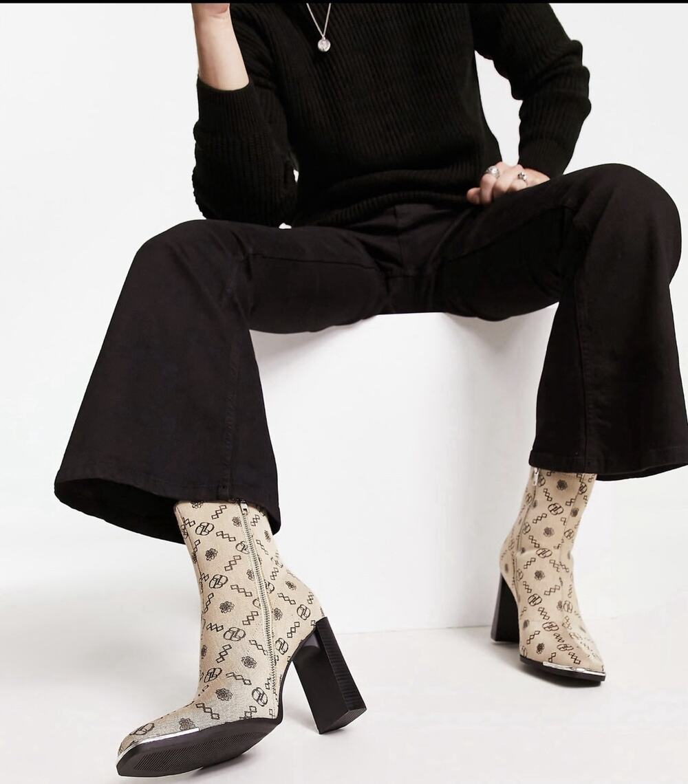 ASOS DESIGN 9 heeled chelsea boots in stone monogram print with toecap detail